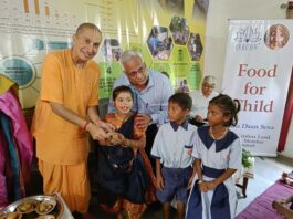 Gauranga Das Prabhu Ji distributing sweets