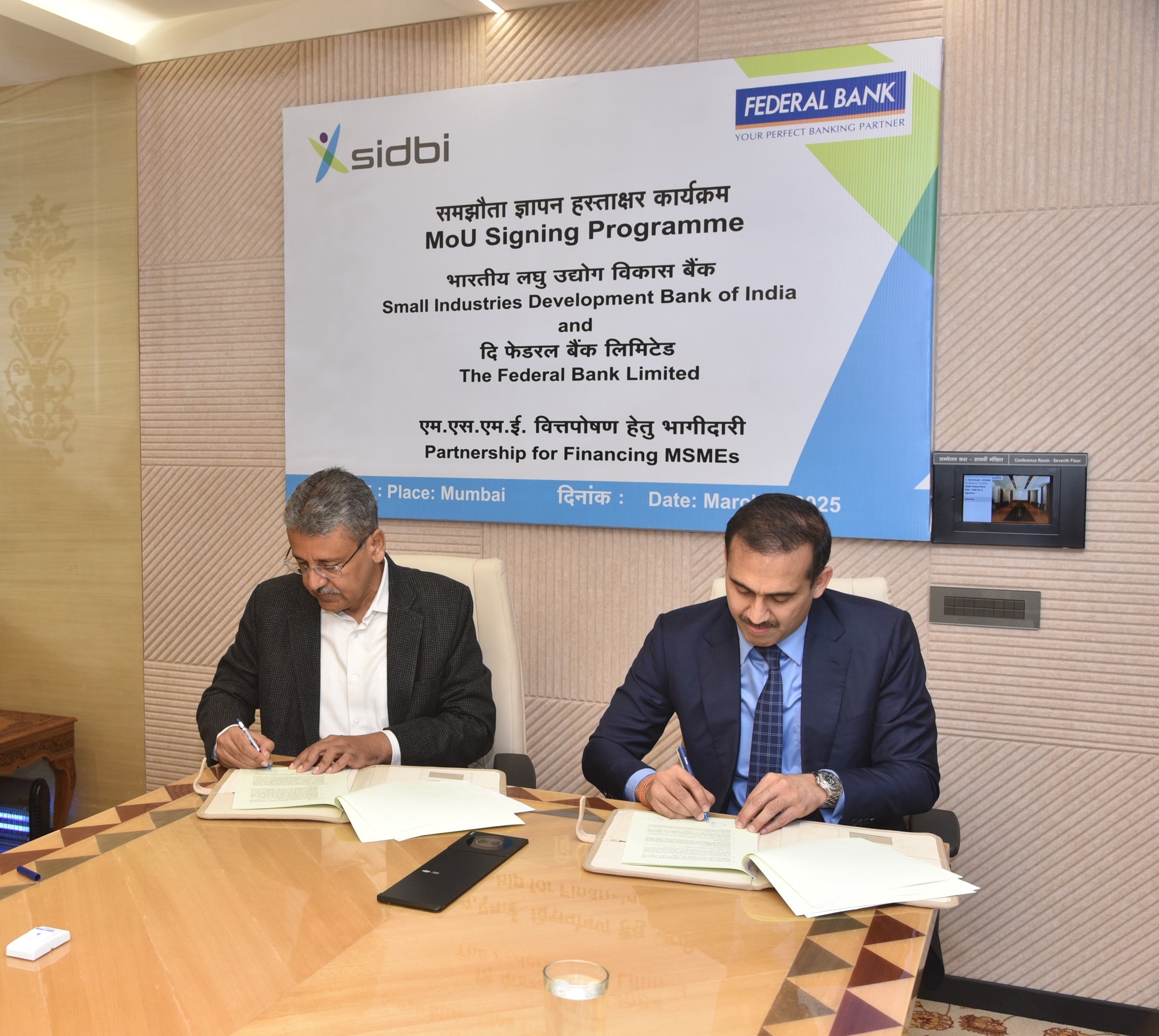 (L-R) - Shri Prakash Kumar, DMD, SIDBI and Shri Harsh Dugar, ED, Federal Bank (1)